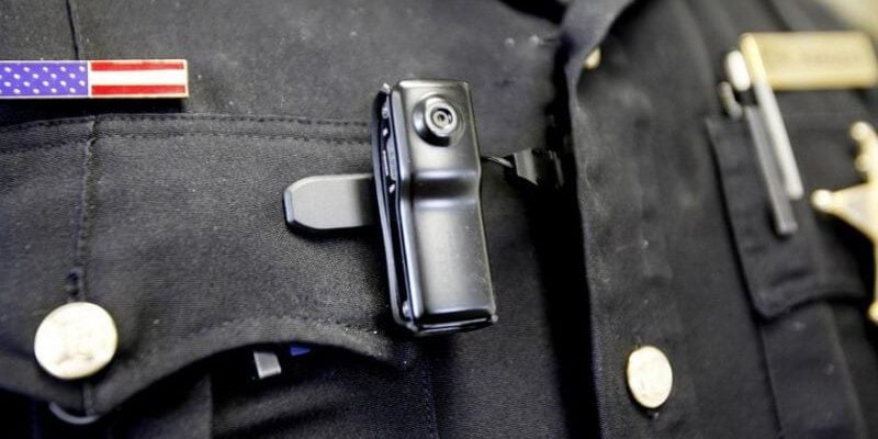 Body-Worn Camera Small Body-Worn Camera attached to officer