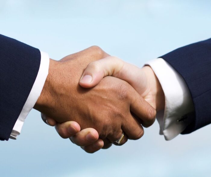 Business deal hand shake